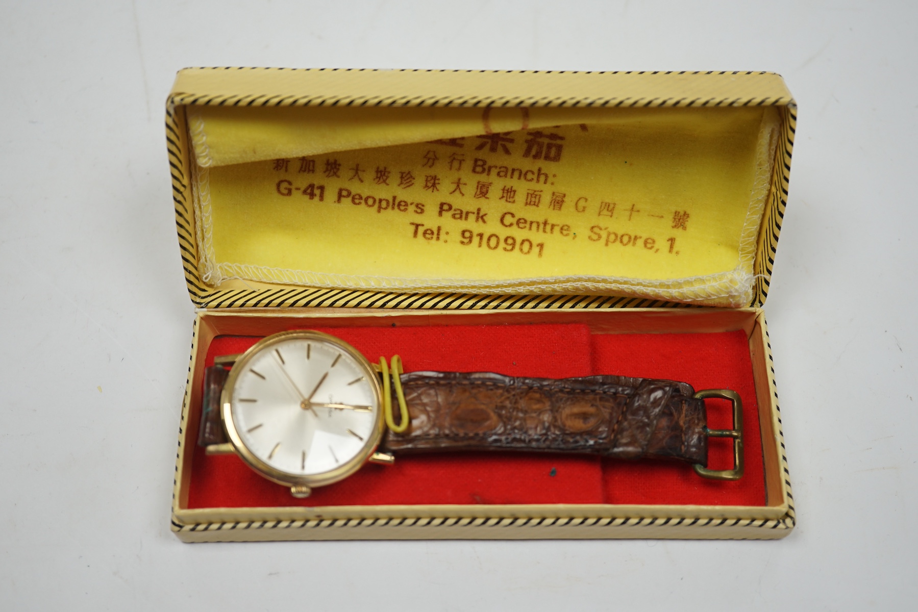 A gentleman's gold plated Omega manual wind wrist watch, on a leather strap, case diameter 34mm. Condition - Fair